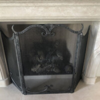 Iron fireplace screen